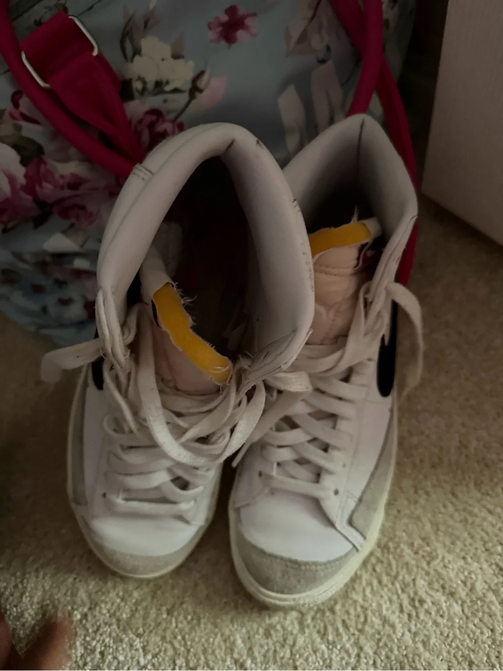 Nike Women’s White High-Top Sneakers with Black Swoosh and Yellow Tongue Accent